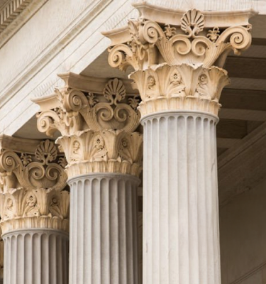 Classical columns symbolising professional standards