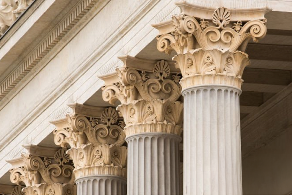 Classical columns symbolising professional standards